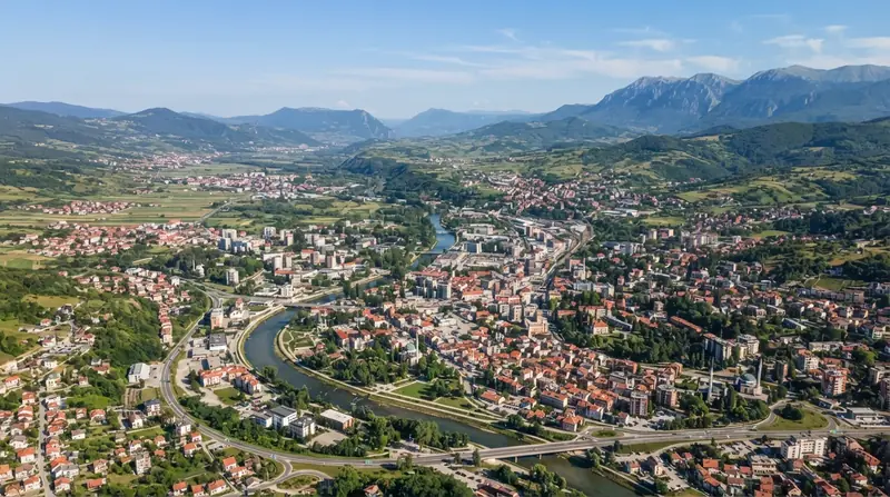 Pogled iz vazduha na naselje u Bosni i Hercegovini — kombi prevoz za Bosnu i Hercegovinu
